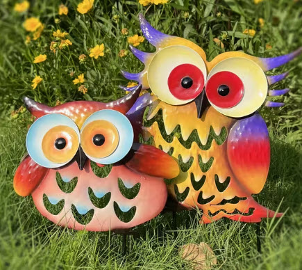 A colourful handcrafted metal owl A colourful handcrafted metal owl